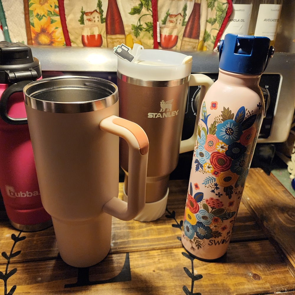 Stanley rose Gold Water cup, and several others